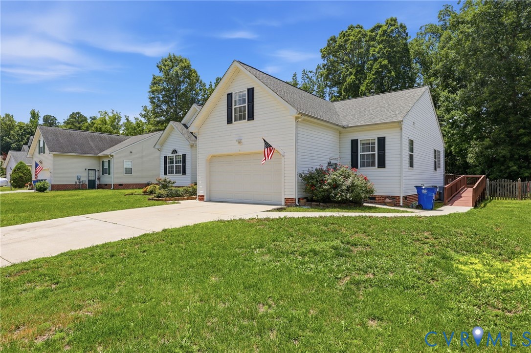 14719 Clover Ridge Lane Chesterfield, VA 23832 - Photo 36 of 36 White siding residence with a two-car garage