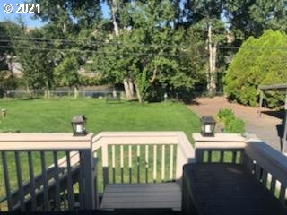 1335 Southwest 41st Street Pendleton, OR 97801 - Photo 23 of 27 a view of a patio with a table chairs and a garden
