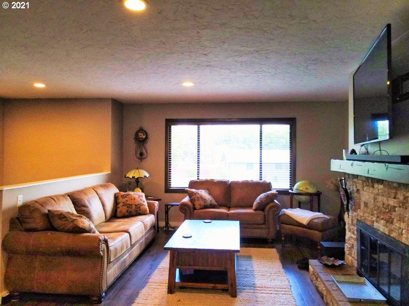 1335 Southwest 41st Street Pendleton, OR 97801 - Photo 4 of 27 a living room with furniture and a fireplace