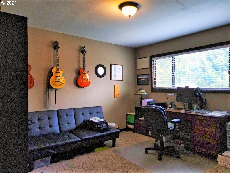 1335 Southwest 41st Street Pendleton, OR 97801 - Photo 10 of 27 a view of a workspace with furniture and a window
