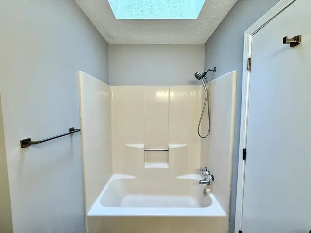 a bathroom with a bathtub