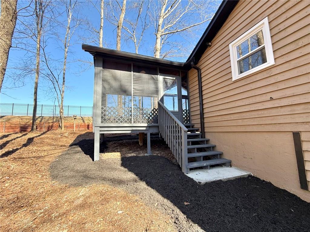 3851 Riding Woods Court Powder Springs, GA 30127 - Photo 31 of 32 a view of deck with patio