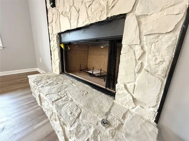 a bedroom with a bed and a mirror