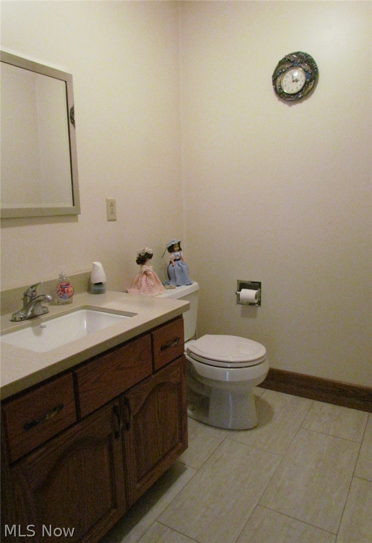 10174 Veto Road Belpre, OH 45714 - Photo 23 of 45 Half bath on main level.