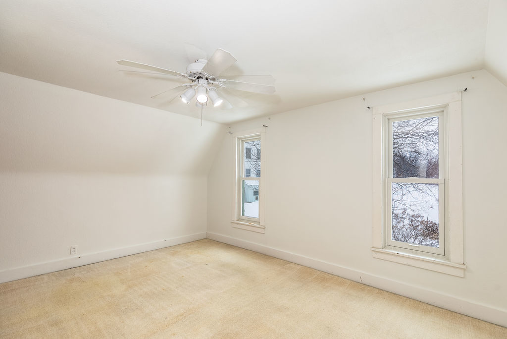809 Franklin Street Galena, IL 61036 - Photo 19 of 28 an empty room with windows and fan