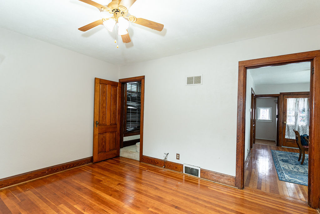 809 Franklin Street Galena, IL 61036 - Photo 2 of 28 a view of an empty room with window and wooden floor