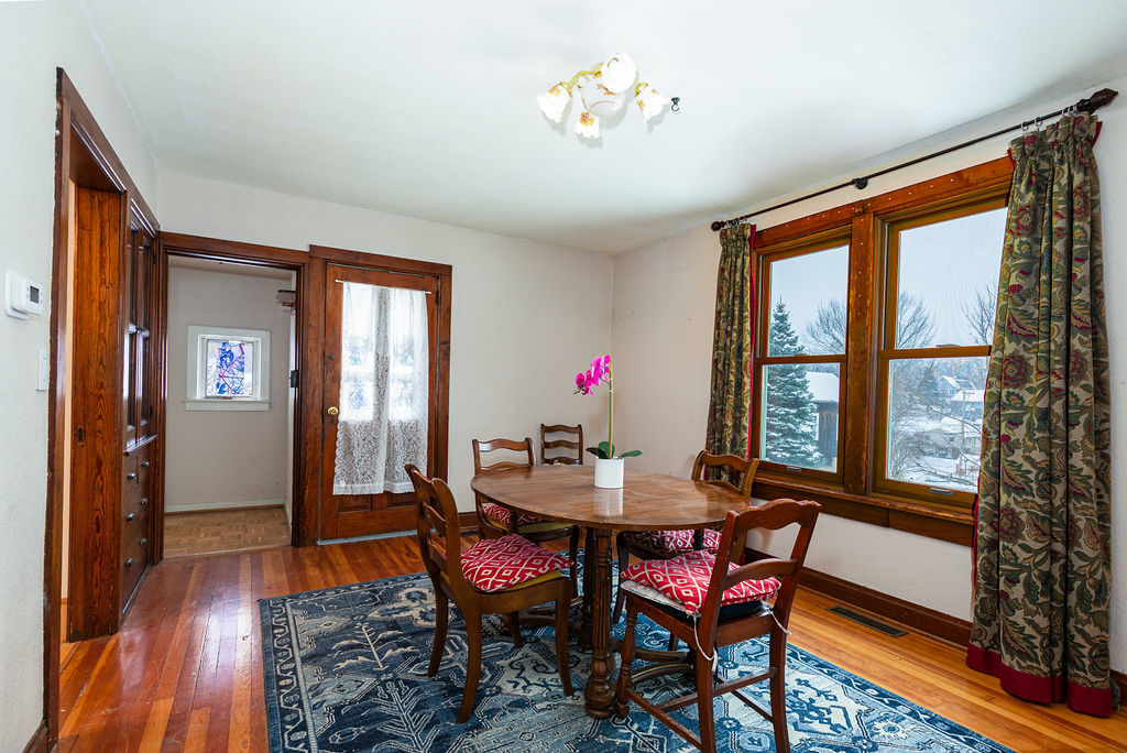 809 Franklin Street Galena, IL 61036 - Photo 9 of 28 a view of a dining room with furniture window and wooden floor