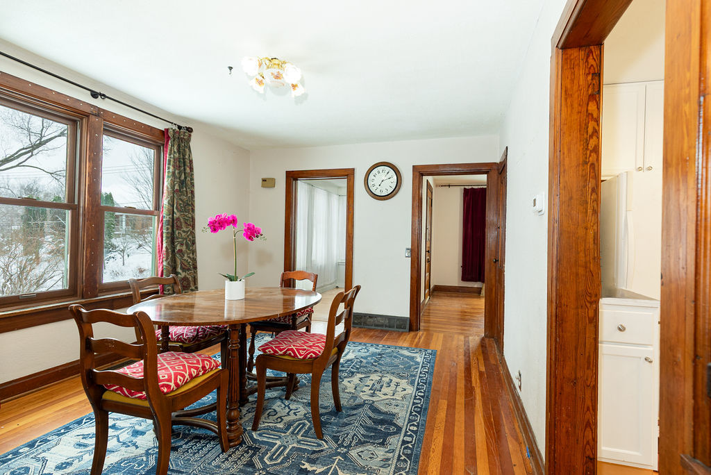 809 Franklin Street Galena, IL 61036 - Photo 10 of 28 a view of a dining room with furniture and a window