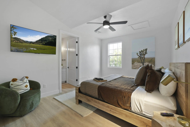 4346 Canterbury Road Hurricane, UT 84737 - Photo 19 of 37 Bedroom featuring light wood finished floors, ceiling fan, ensuite bathroom, and vaulted ceiling