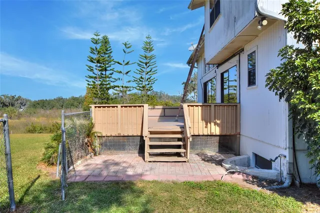 a view of a backyard with a garden