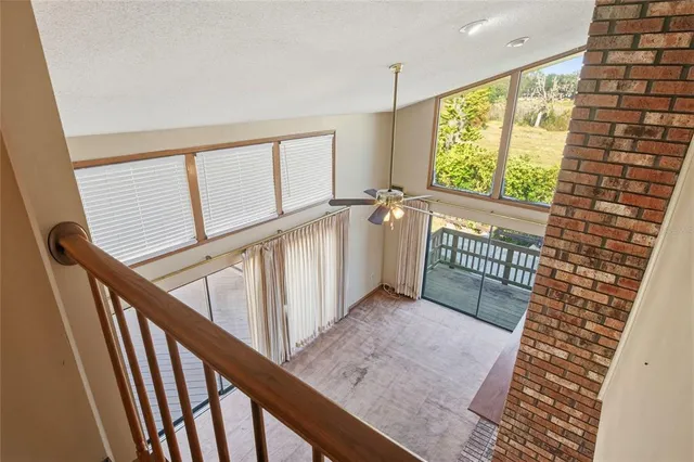 a view of empty room with fireplace