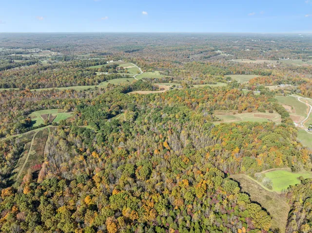 an aerial view of beach and residential space