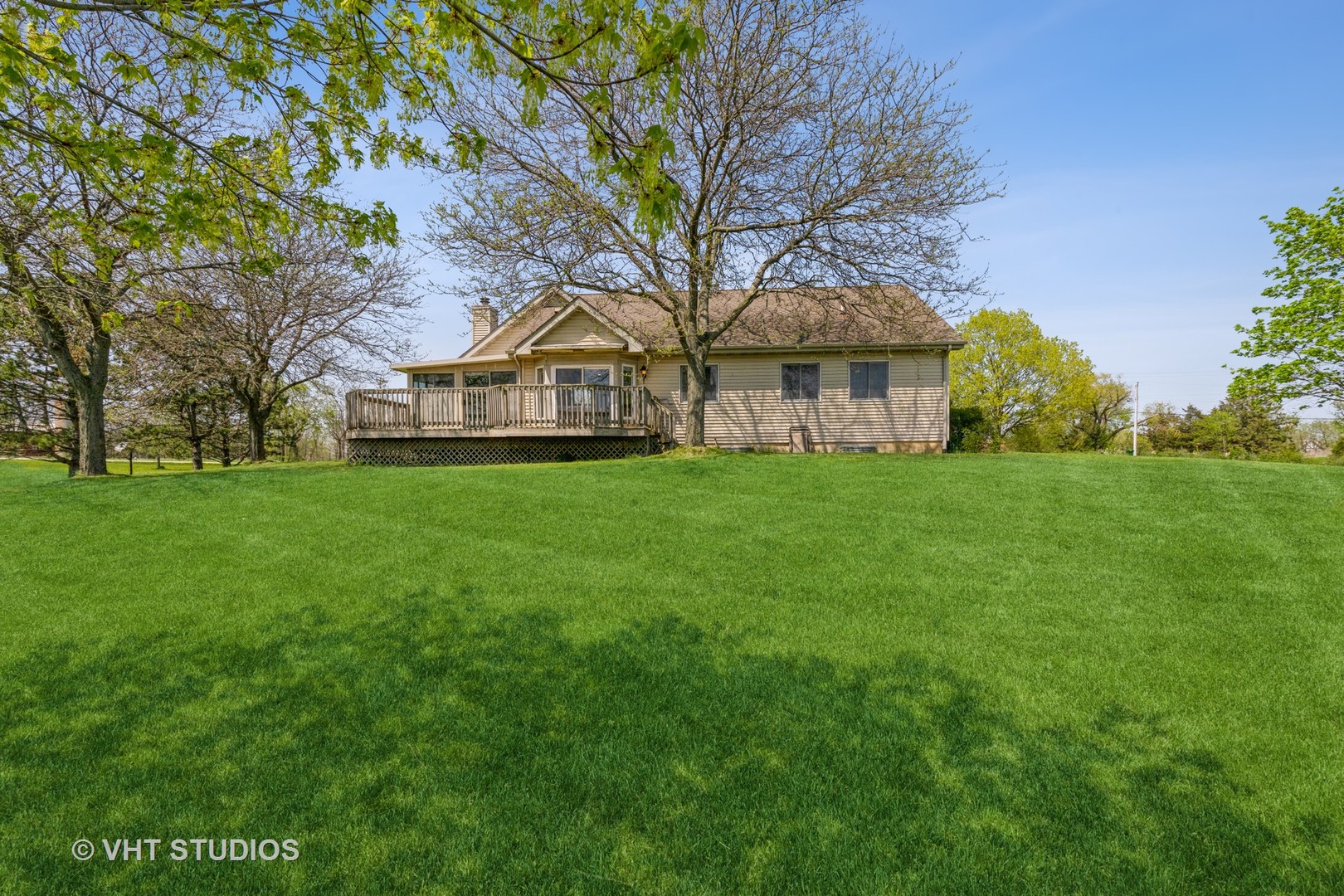 16943 West State Line Road Zion, IL 60099 - Photo 21 of 26 a view of a house with a big yard and large trees