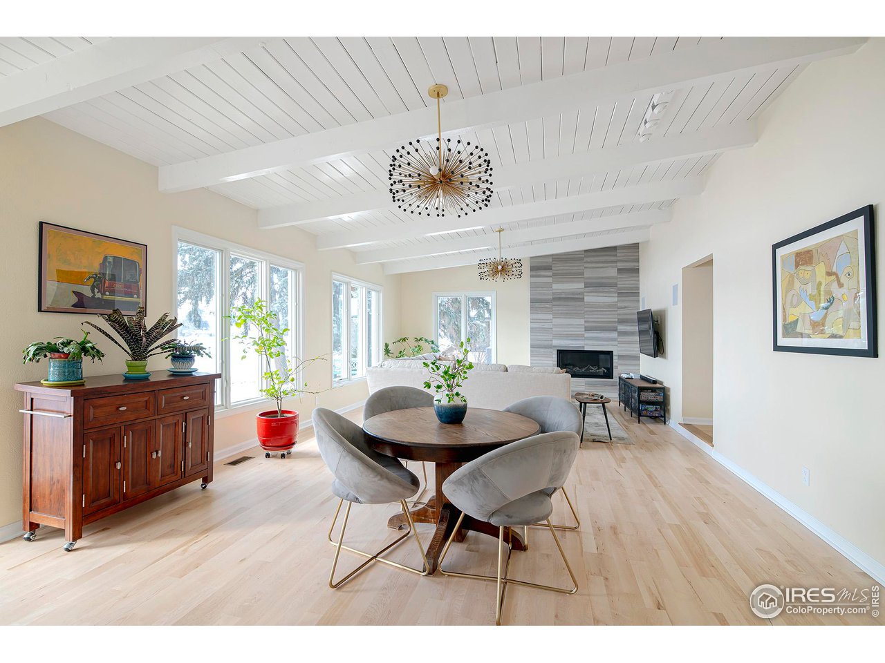 7034 Indian Peaks Trail Boulder, CO 80301 - Photo 11 of 40 a view of a dining room with furniture and chandelier
