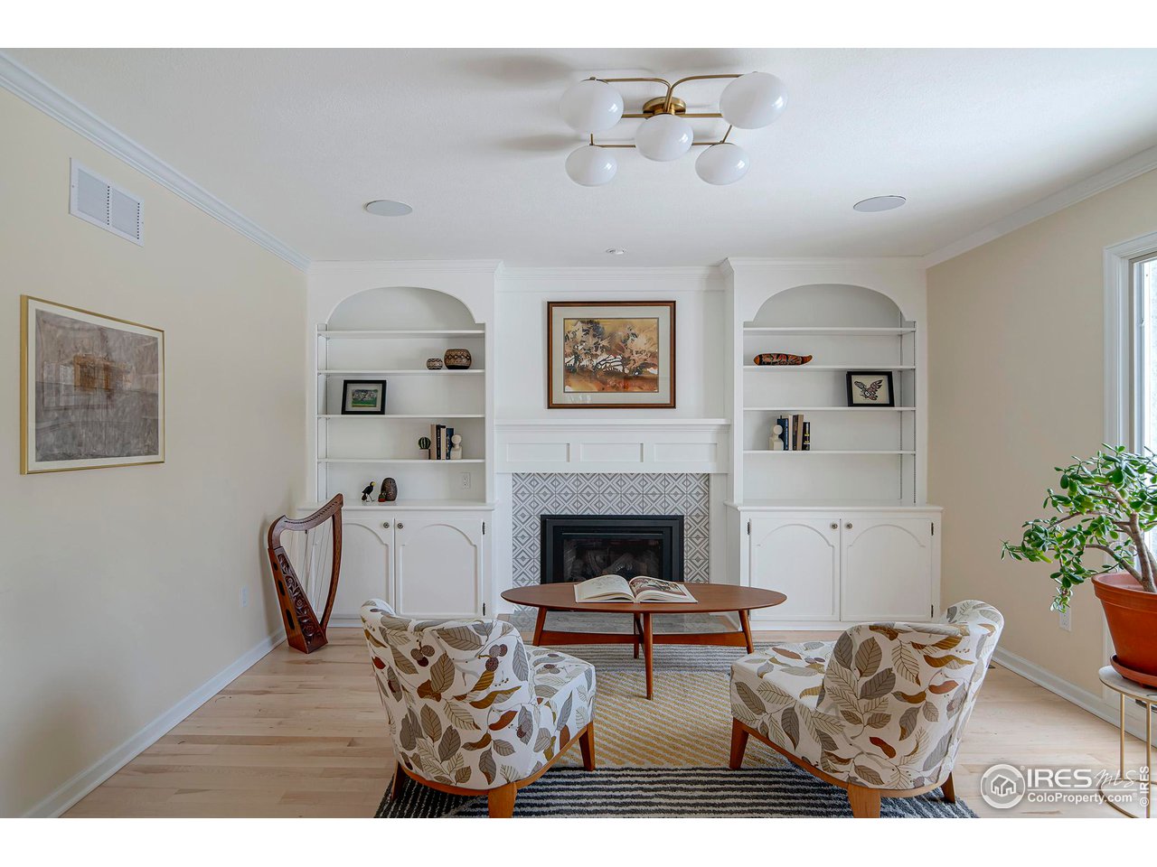 7034 Indian Peaks Trail Boulder, CO 80301 - Photo 16 of 40 a living room with furniture and a fireplace