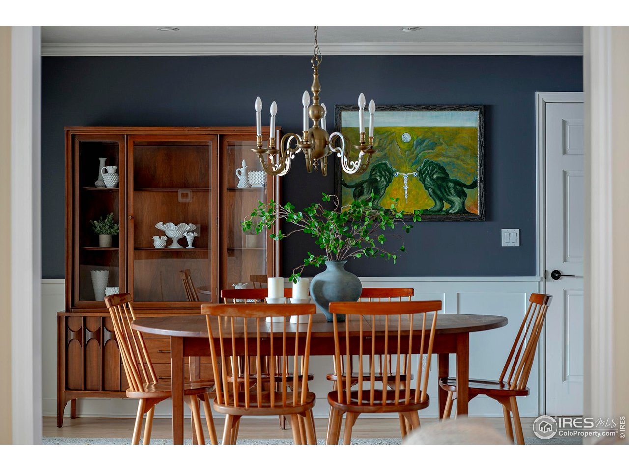 7034 Indian Peaks Trail Boulder, CO 80301 - Photo 19 of 40 a view of a dining room with furniture and chandelier