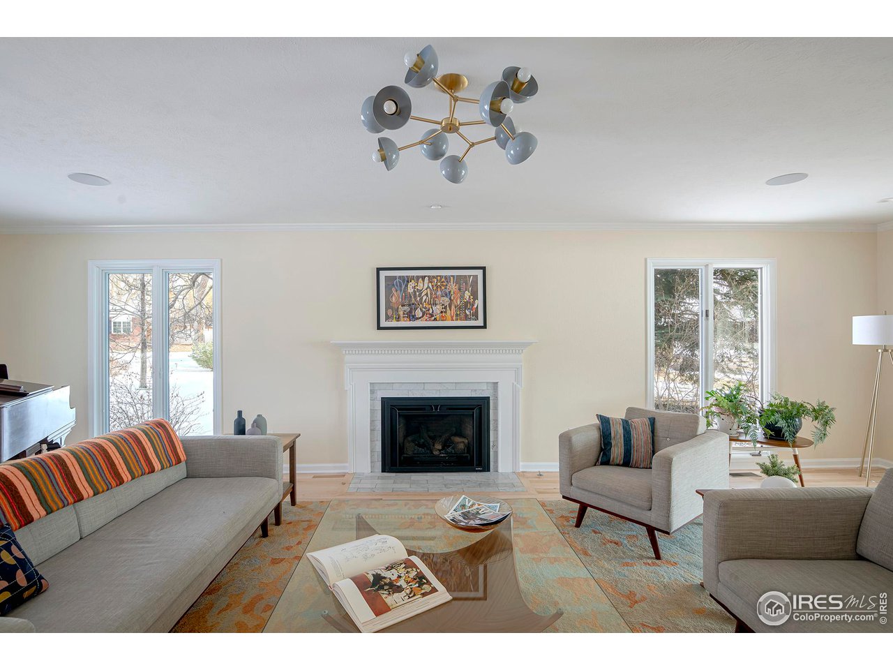 7034 Indian Peaks Trail Boulder, CO 80301 - Photo 20 of 40 a living room with furniture and a fireplace