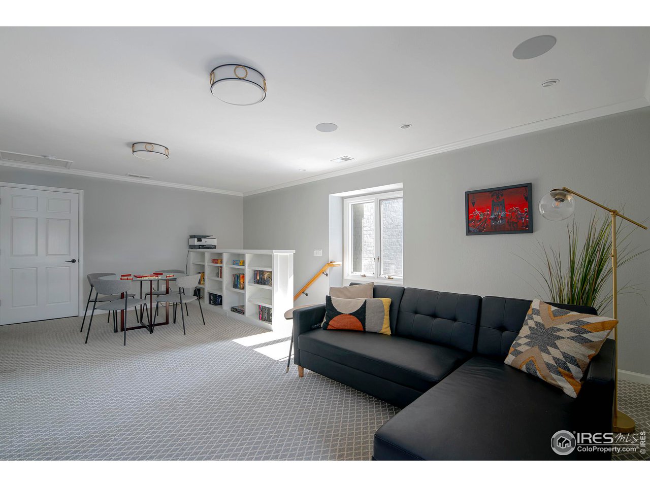 7034 Indian Peaks Trail Boulder, CO 80301 - Photo 34 of 40 a living room with furniture and a wooden floor