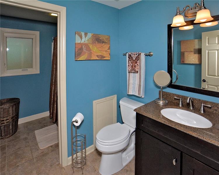 111 McDermott Road Trafford, PA 15085 - Photo 17 of 25 Updated top level main bath for the secondary bedrooms.