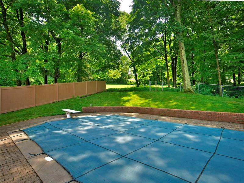 111 McDermott Road Trafford, PA 15085 - Photo 24 of 25 Serene backyard with composite fence to the left. Wooded views abound on this 2 acre property! A fabulous 20x12 storage barn is included to house exterior equipment.