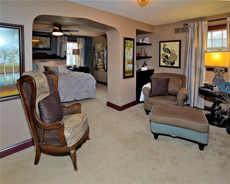 111 McDermott Road Trafford, PA 15085 - Photo 10 of 25 The total renovation of the master suite was completed to include a sitting area, a walk-in closet plus double closets, built-in drawers and shelving, master bath, and access to the covered deck.
