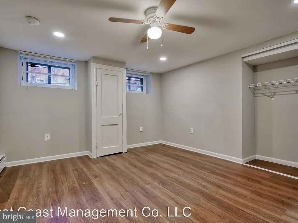 917 North Calvert Street, Unit 1 Baltimore, MD 21202 - Photo 24 of 24 wooden floor in an empty room