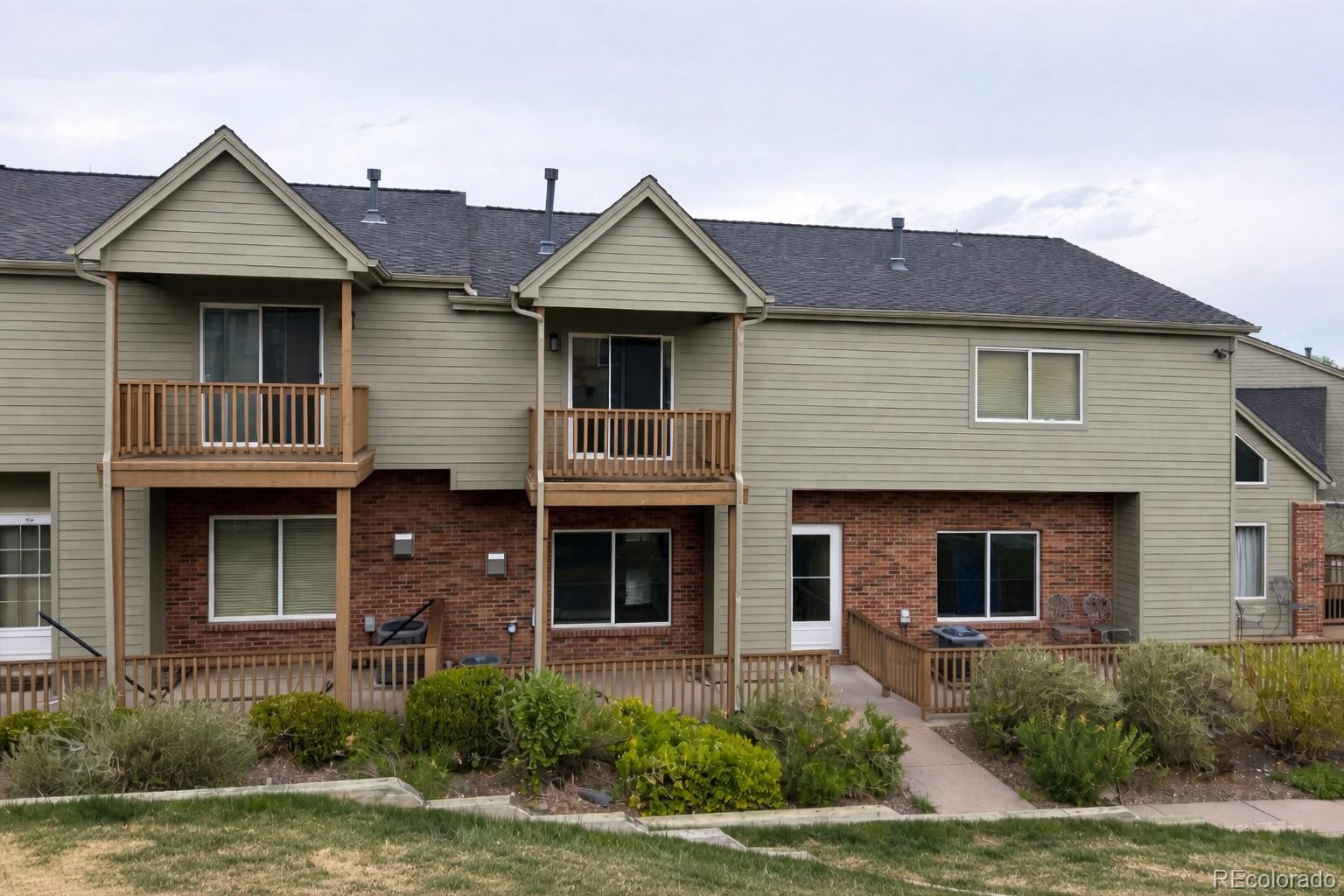 426 Anvil Way Golden, CO 80401 - Photo 2 of 8 a front view of a house with garden