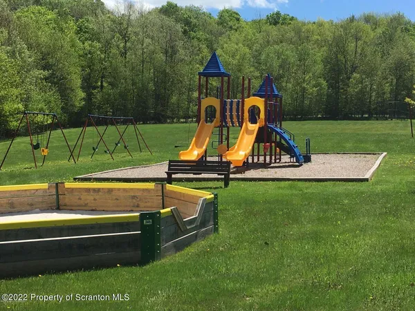 a view of a park with slide