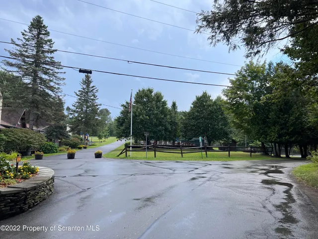 a view of an outdoor space with a garden and entertaining space