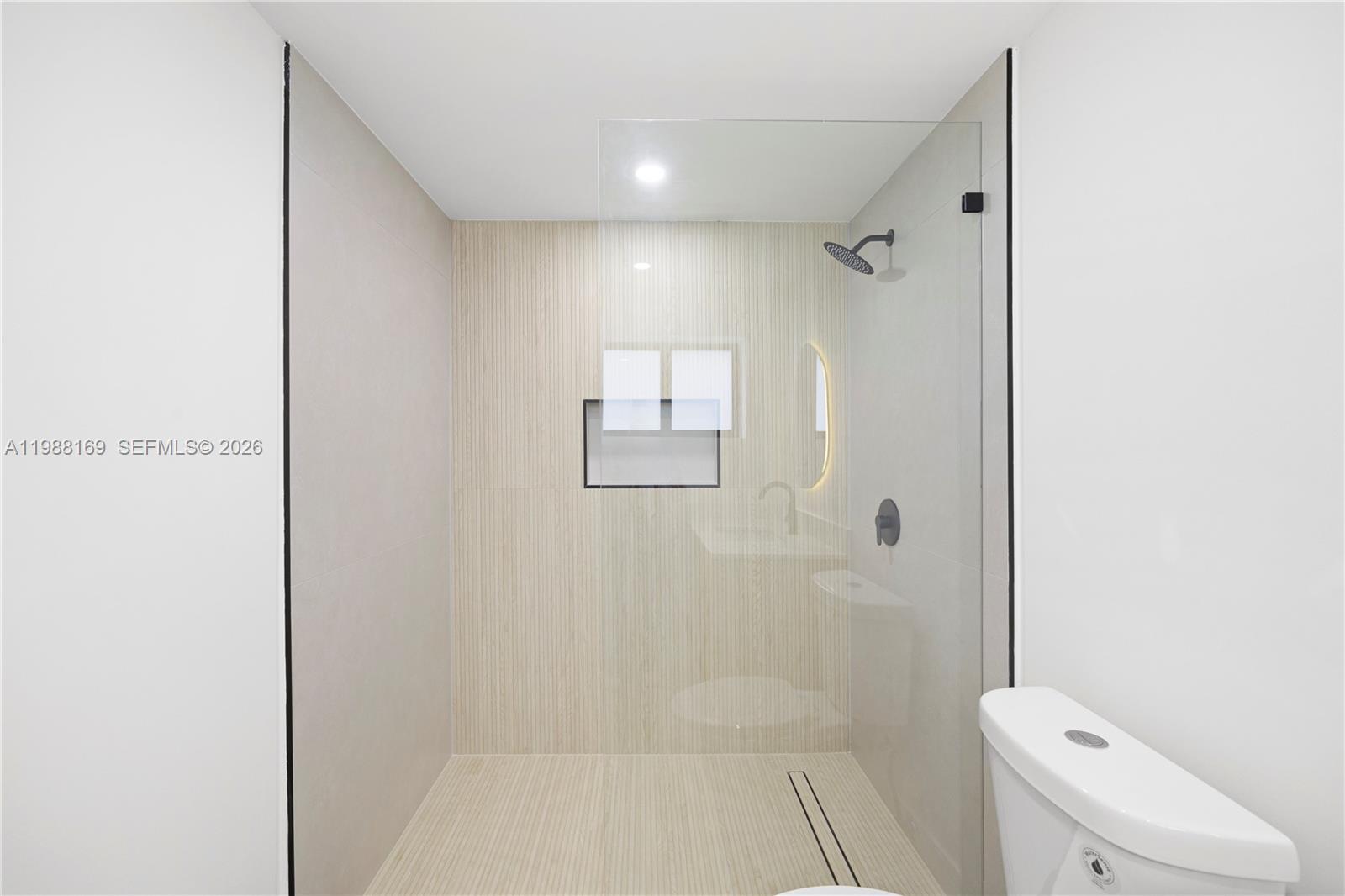 421 Northwest 81st Street Miami, FL 33150 - Photo 21 of 39 a bathroom with a bathtub and toilet