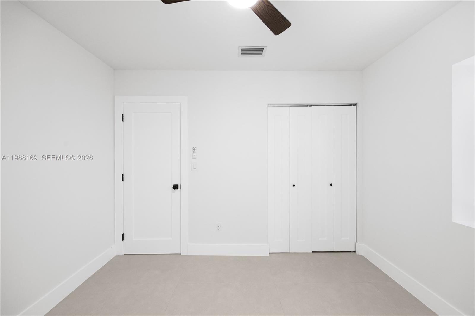 421 Northwest 81st Street Miami, FL 33150 - Photo 23 of 39 wooden floor in an empty room