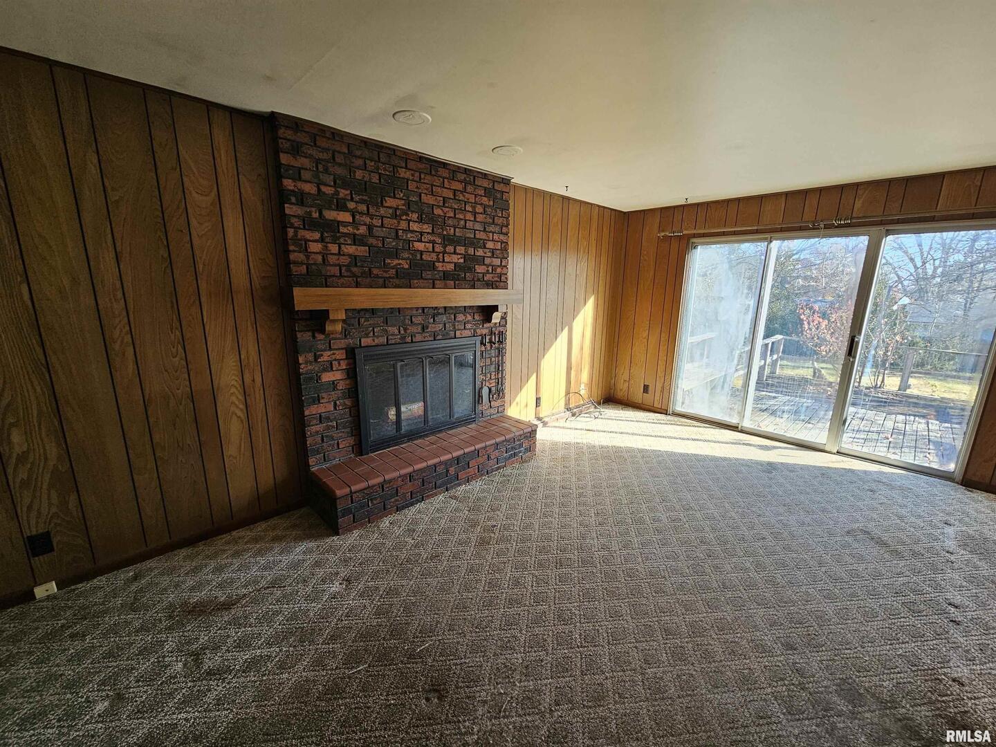 1604 Salem Road Mount Vernon, IL 62864 - Photo 16 of 21 a living room with furniture and a fireplace