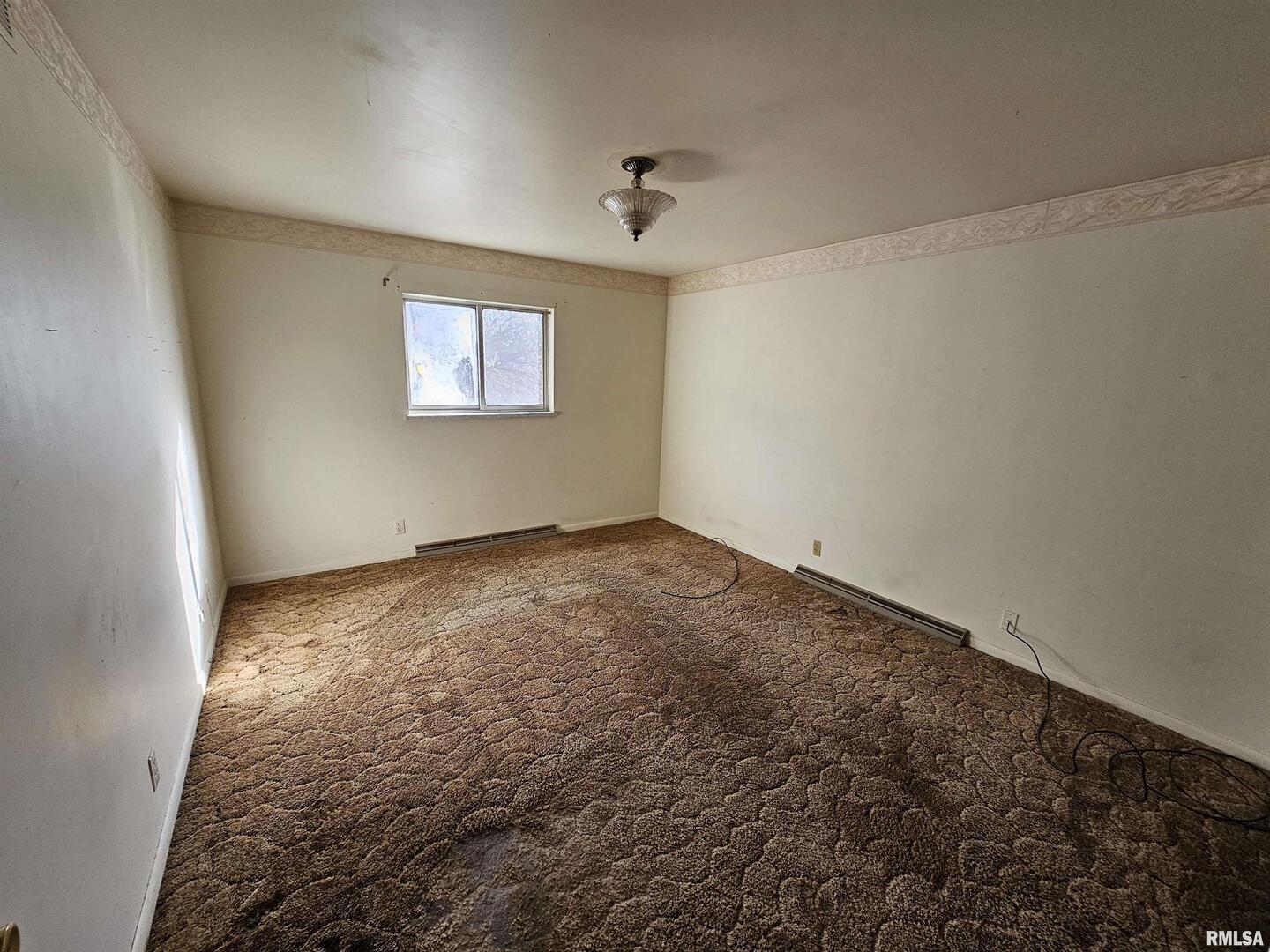 1604 Salem Road Mount Vernon, IL 62864 - Photo 17 of 21 an empty room with a window