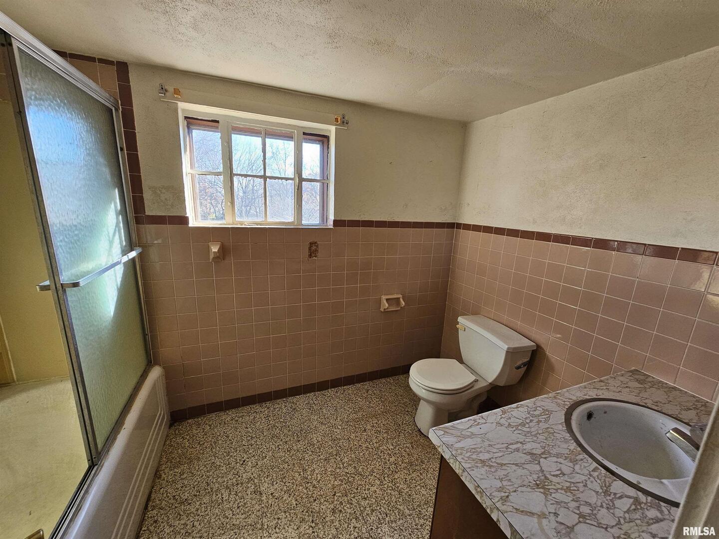 1604 Salem Road Mount Vernon, IL 62864 - Photo 20 of 21 a bathroom with a granite countertop sink and a mirror