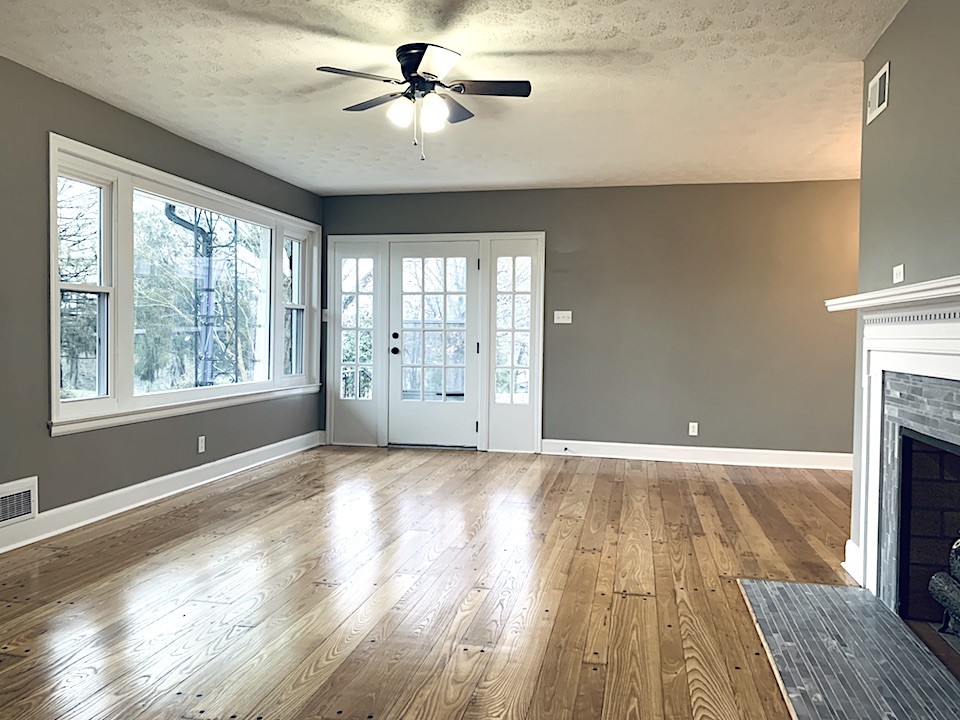 109 Kinneys Road Springfield, TN 37172 - Photo 6 of 15 a view of an empty room with a window and wooden floor