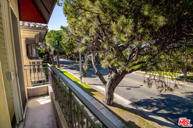 a view of swimming pool from a balcony