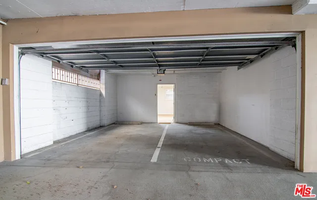 a view of an empty room with empty racks