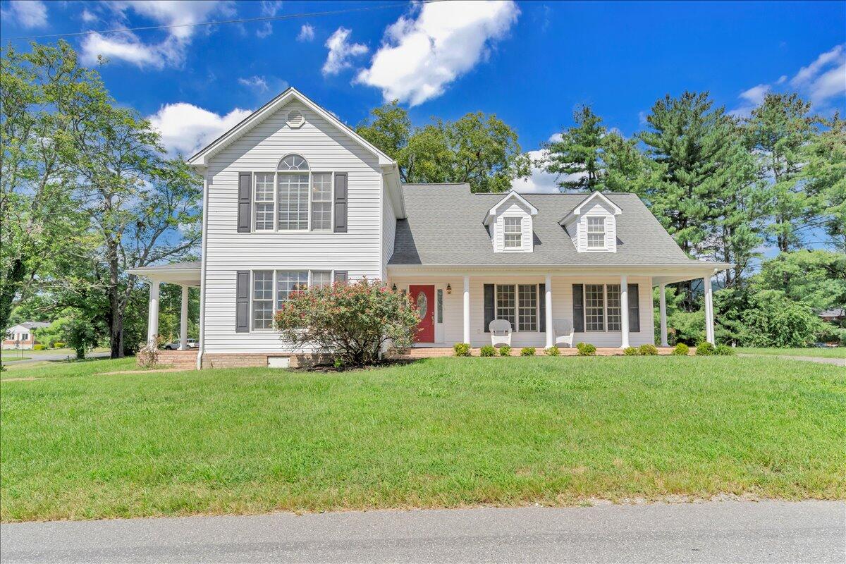 6510 Brookfield Road Roanoke, VA 24019 - Photo 100 of 119 a front view of a house with a yard