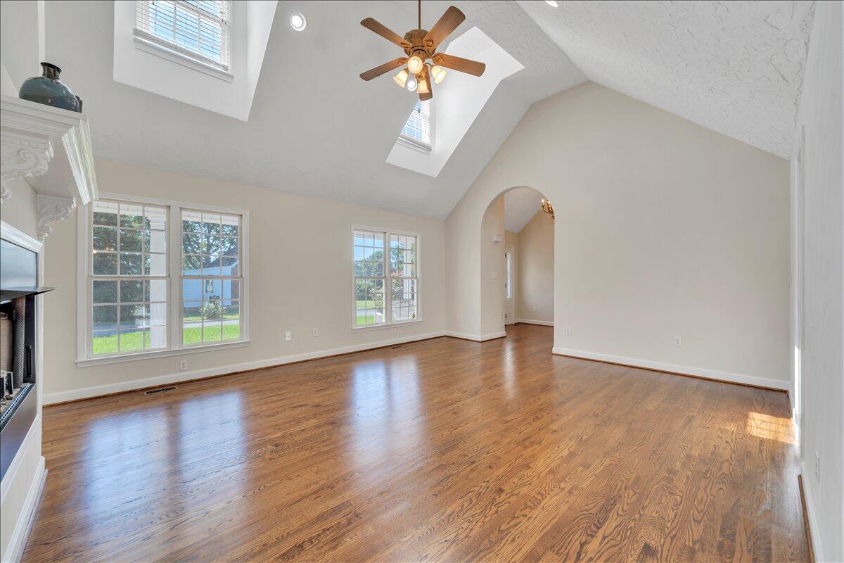 6510 Brookfield Road Roanoke, VA 24019 - Photo 18 of 119 a view of an empty room with wooden floor and a window