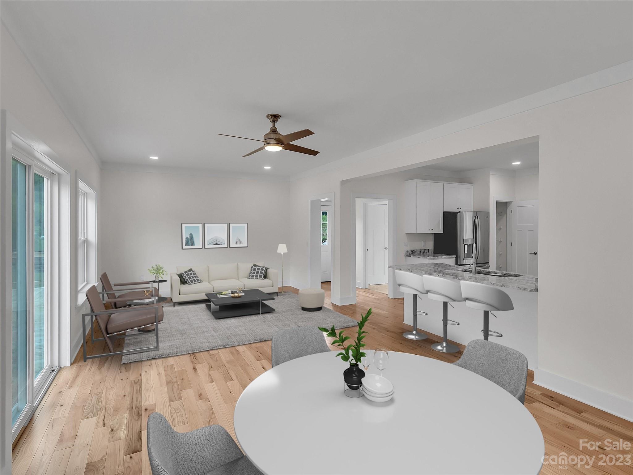 160 Rdg Vw Drive, Unit 21 Clyde, NC 28721 - Photo 20 of 39 a living room with furniture and view of kitchen