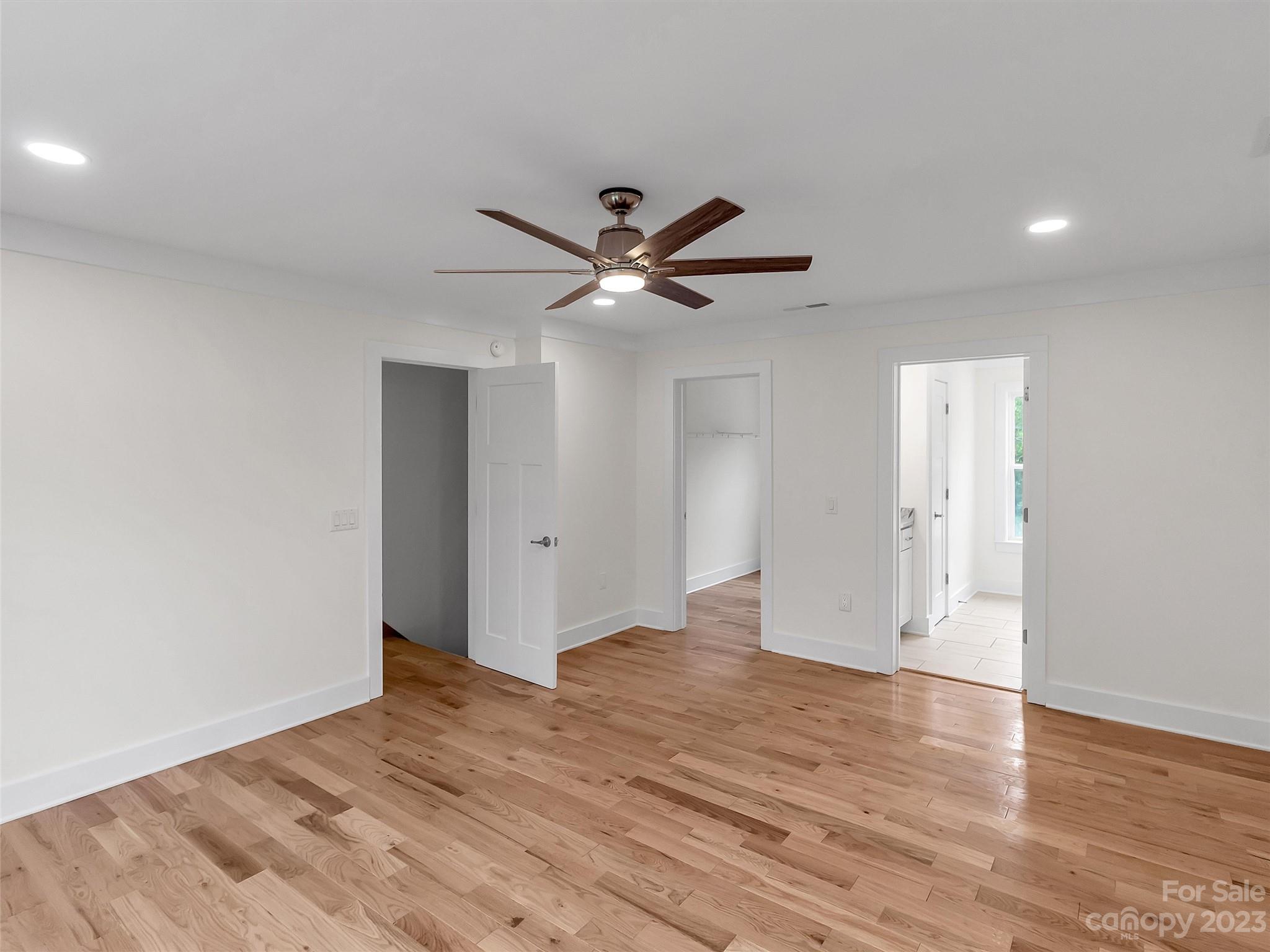 160 Rdg Vw Drive, Unit 21 Clyde, NC 28721 - Photo 29 of 39 a view of an empty room with wooden floor