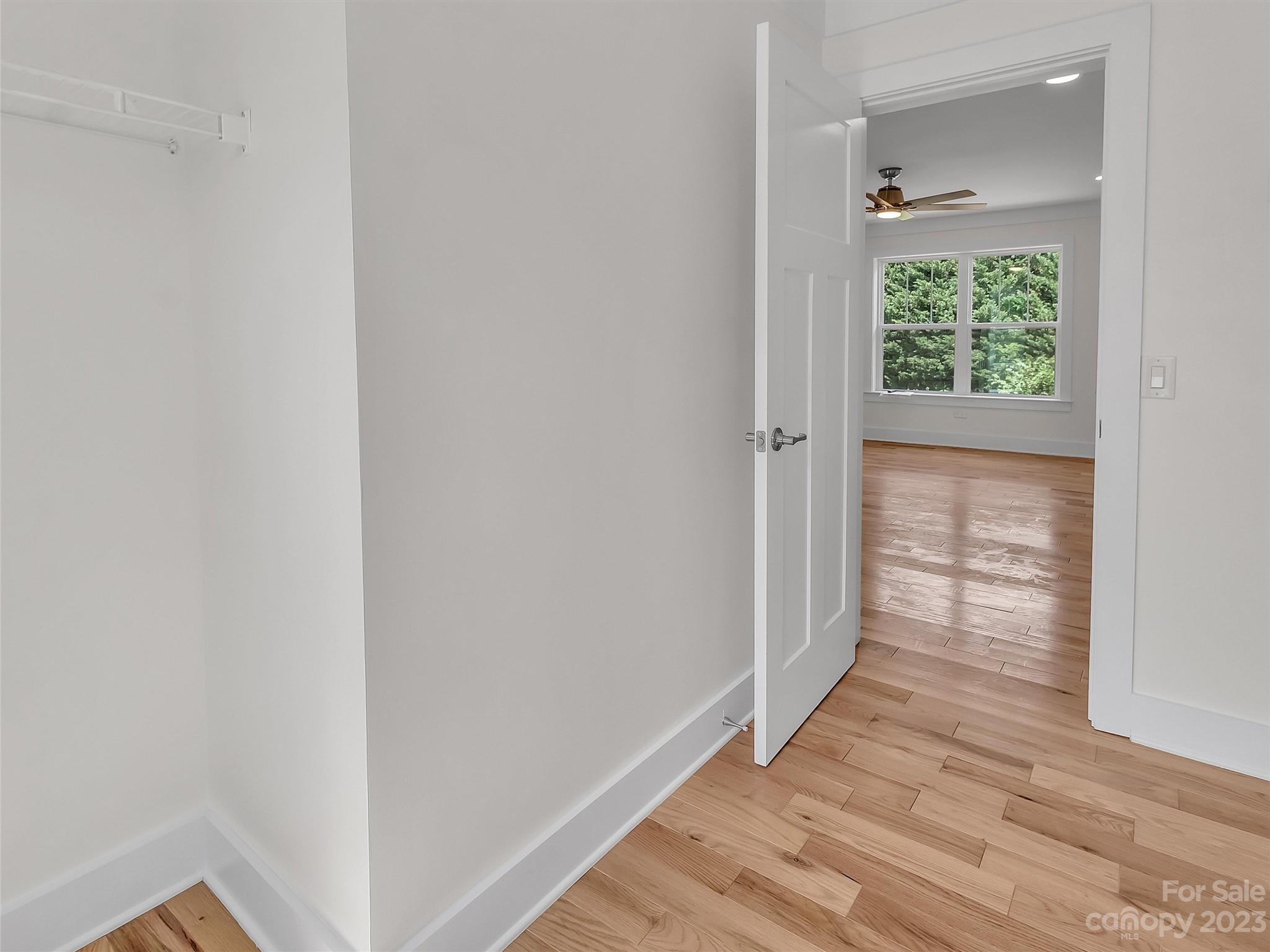 160 Rdg Vw Drive, Unit 21 Clyde, NC 28721 - Photo 32 of 39 a view of hallway with wooden floor