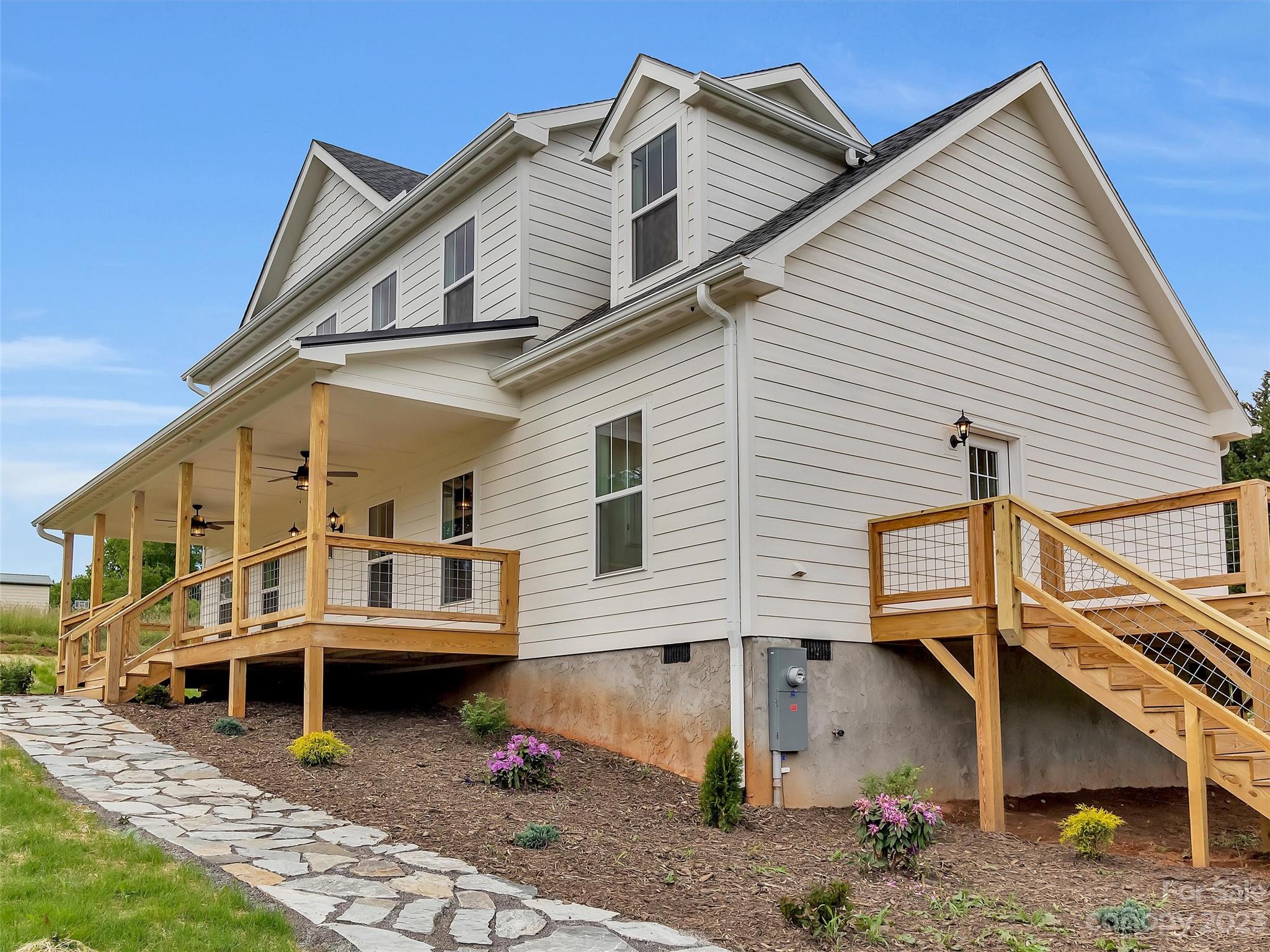 160 Rdg Vw Drive, Unit 21 Clyde, NC 28721 - Photo 9 of 39 a view of a house with a yard