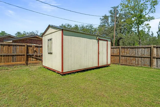 a view of backyard with green space
