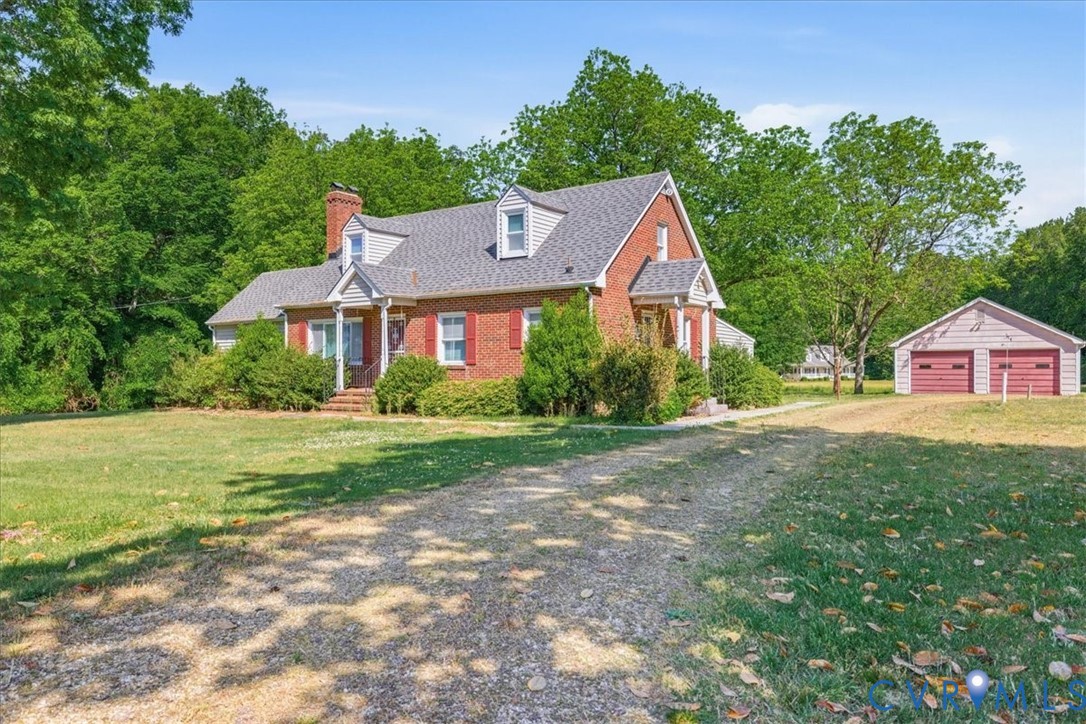 8100 Sandy Ridge Road Hopewell, VA 23860 - Photo 3 of 36 Brick exterior residence featuring a gray shingle