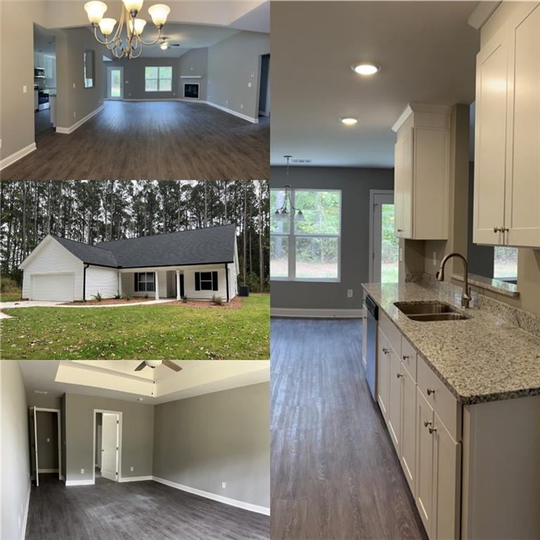 444 Watson Road Winder, GA 30680 - Photo 1 of 1 a kitchen with kitchen island granite countertop a stove and a wooden floors