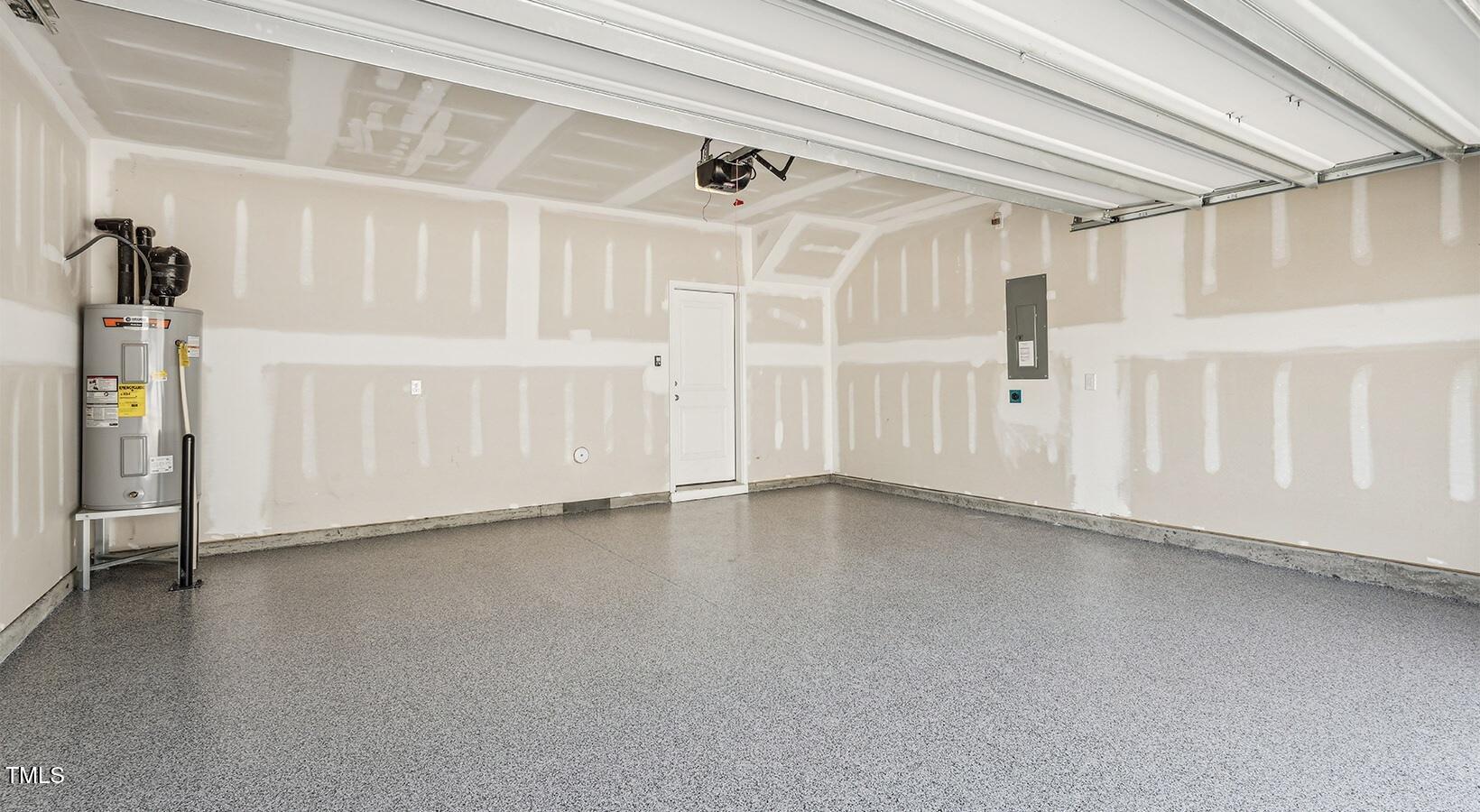 101 Decatur Drive Raleigh, NC 27603 - Photo 14 of 24 HudsonatGeorgiasLanding_ModelEmptyGarage