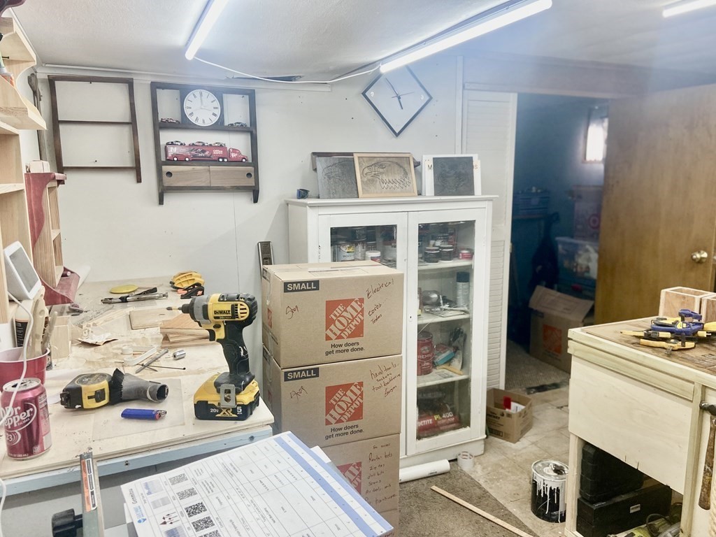 44 Brewster Road Waltham, MA 02451 - Photo 9 of 31 a storage room with washer and dryer