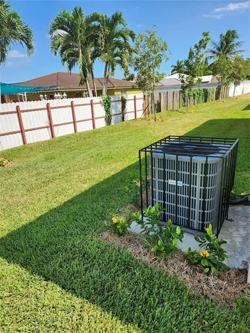 a view of a house with a garden