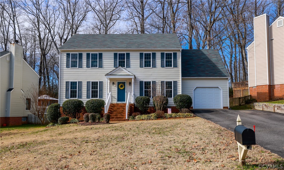 5404 Chestnut Bluff Road Midlothian, VA 23112 - Photo 47 of 48 a front view of a house with yard slide barbeque oven and barbeque oven